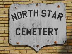 North Star Cemetery Sign on Wall